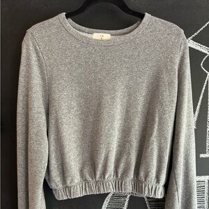 Anthropologie cropped sweatshirt.
